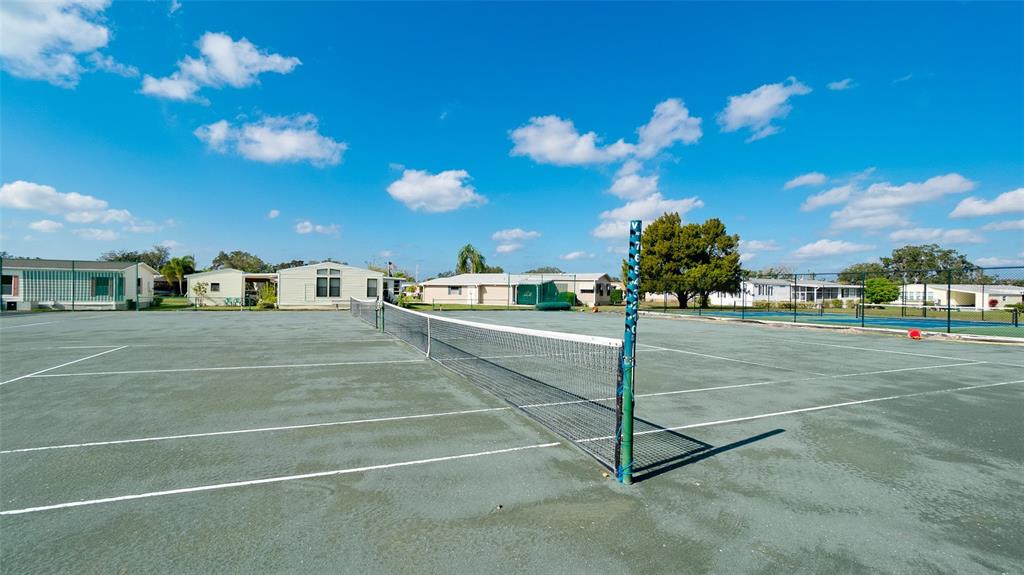 90 Whipporwill Court Ellenton, FL 34222 - Photo 28 of 34 a view of a tennis court