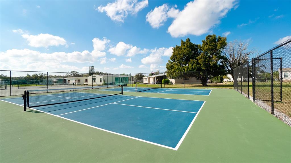 90 Whipporwill Court Ellenton, FL 34222 - Photo 31 of 34 a view of tennis court