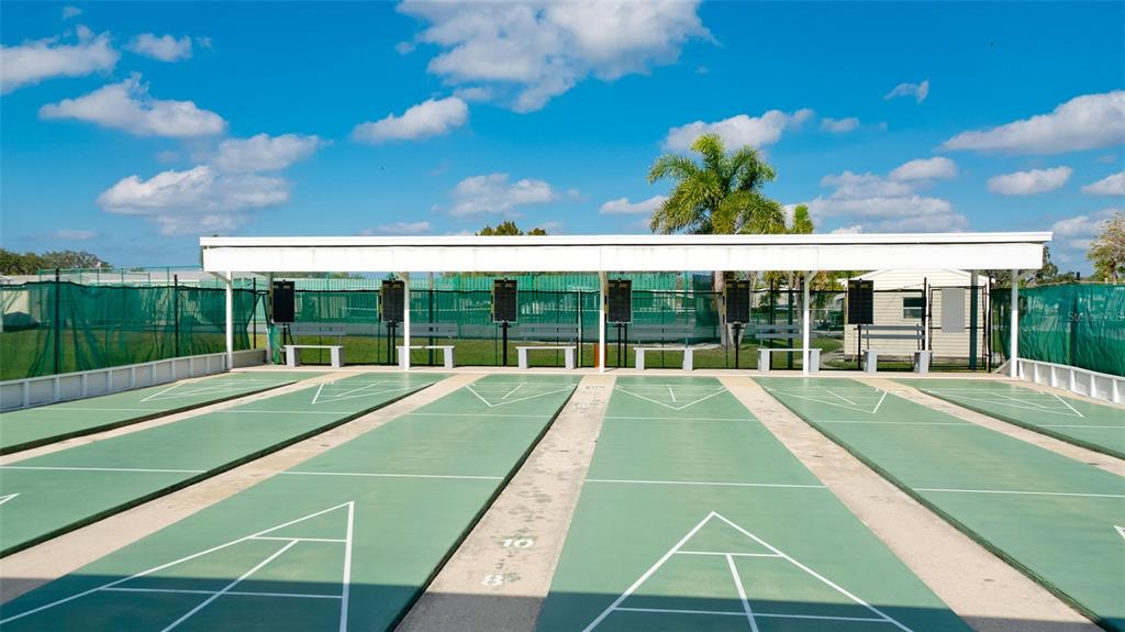 90 Whipporwill Court Ellenton, FL 34222 - Photo 32 of 34 a view of yard with swimming pool and outdoor seating