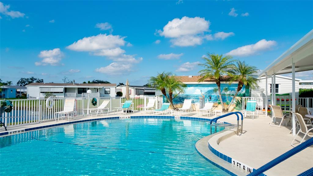 90 Whipporwill Court Ellenton, FL 34222 - Photo 33 of 34 a view of a swimming pool with seating space