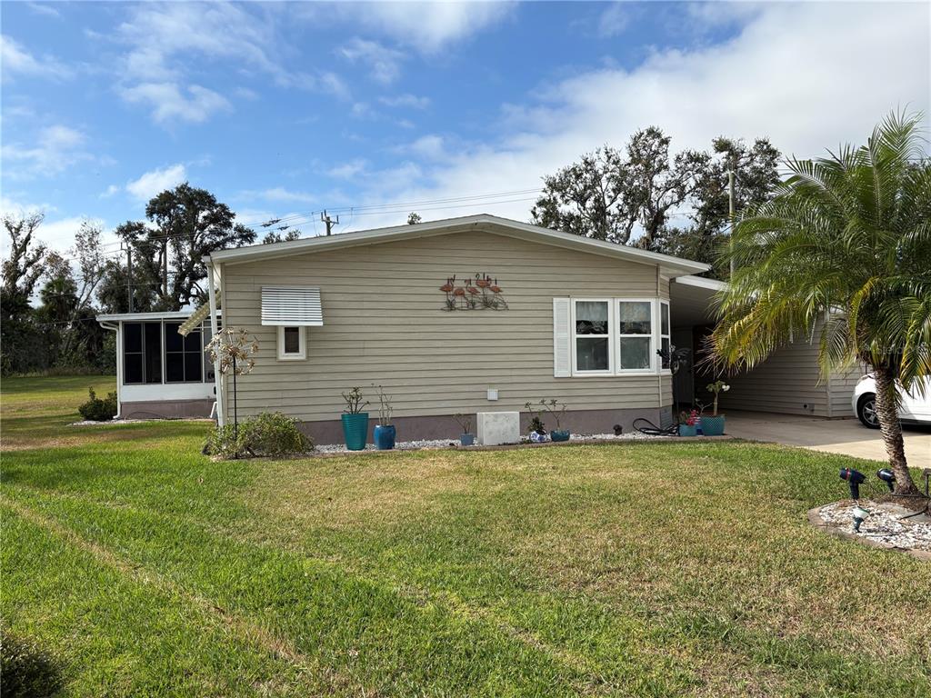 90 Whipporwill Court Ellenton, FL 34222 - Photo 6 of 34 a view of a house with a yard