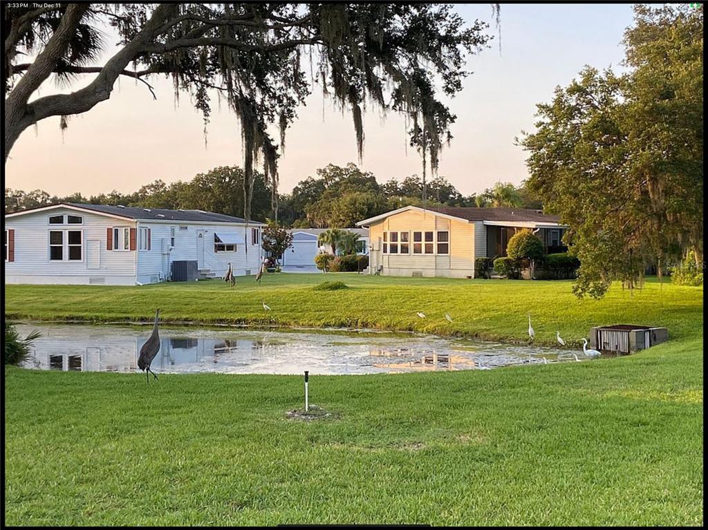90 Whipporwill Court Ellenton, FL 34222 - Photo 8 of 34 a view of a house with a big yard