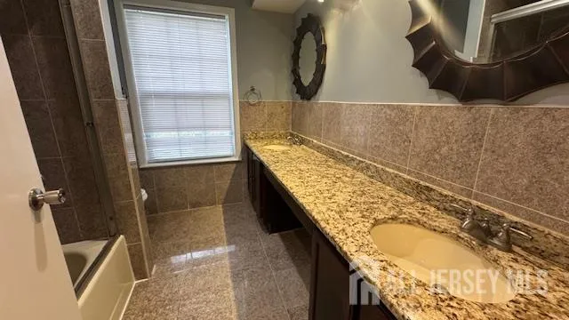 a view of balcony with furniture