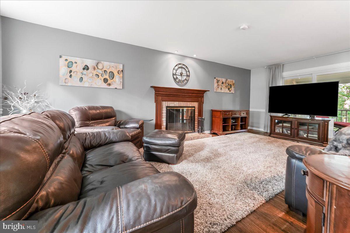 686 Limehouse Road Wayne, PA 19087 - Photo 6 of 51 a living room with furniture and a flat screen tv