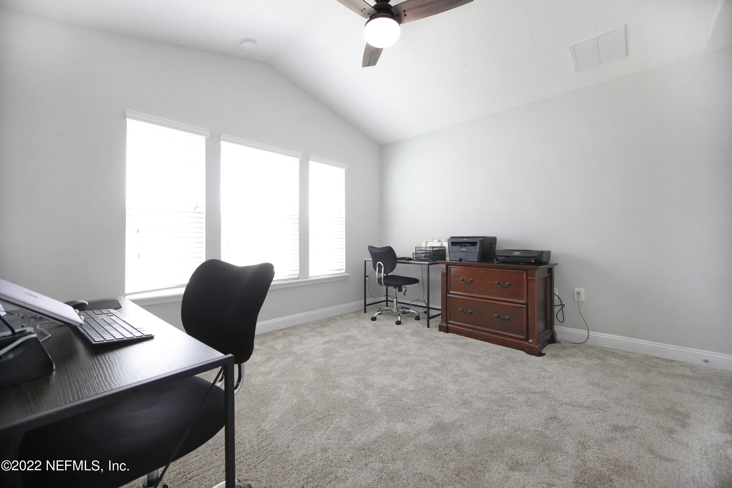 900 Deer Crossing Road St. Augustine, FL 32086 - Photo 12 of 29 a work room with furniture and a window