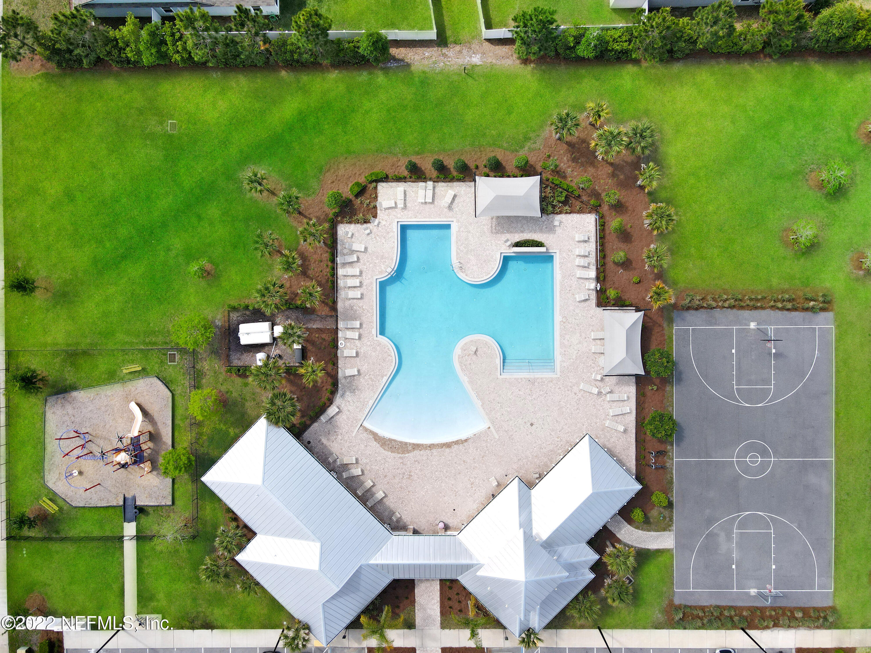 900 Deer Crossing Road St. Augustine, FL 32086 - Photo 21 of 29 an aerial view of a house with garden space and lake view