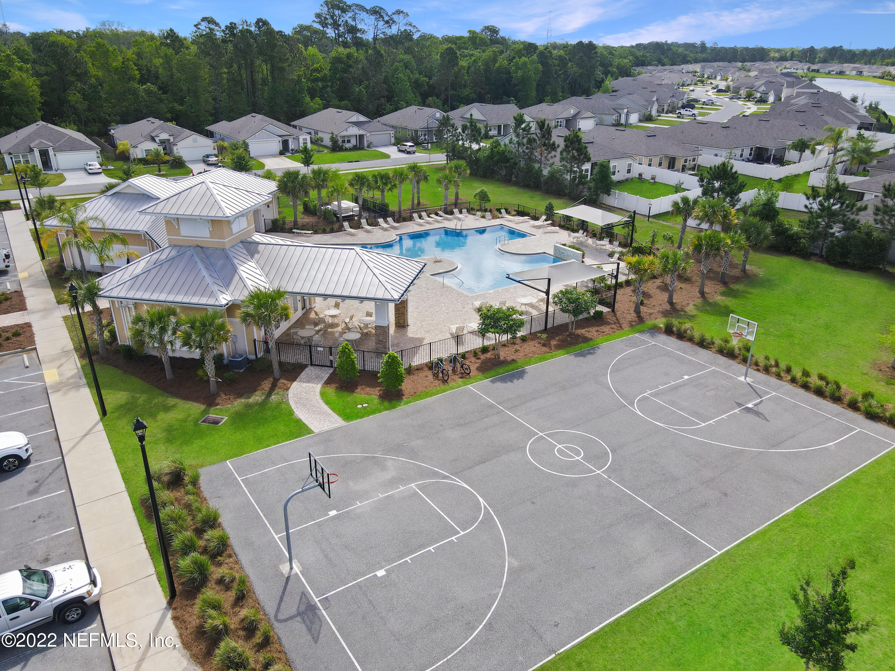 900 Deer Crossing Road St. Augustine, FL 32086 - Photo 26 of 29 an aerial view of a house with a yard basket ball court and outdoor seating