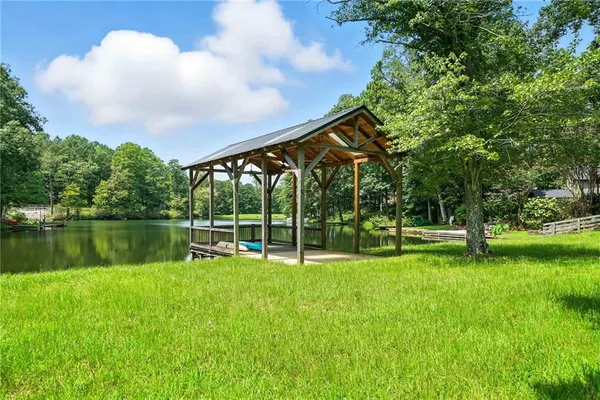 a view of a garden with a lake