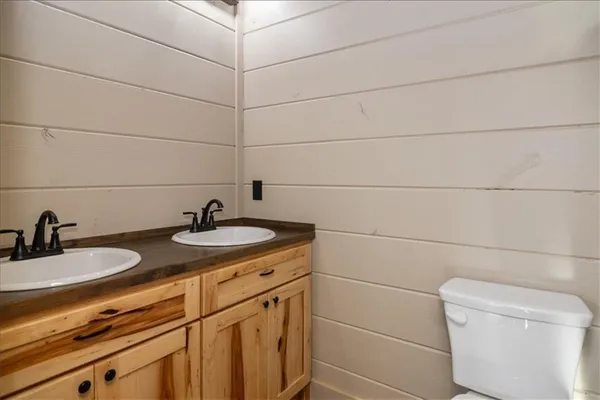a bathroom with a sink and a toilet