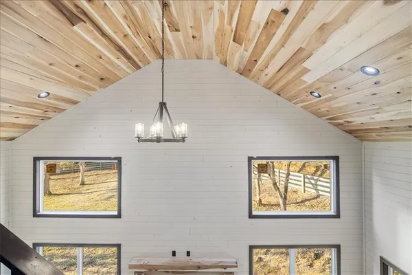 a view of an entryway with a chandelier