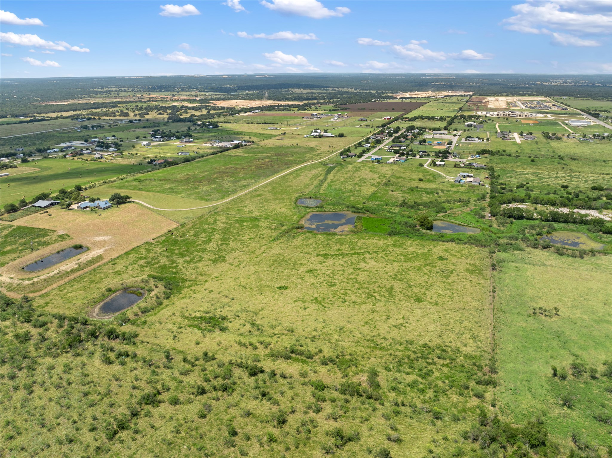 1775 County Road 305 Jarrell, TX 76537 - Photo 11 of 11 Aerial overview of property's location with rural landscape