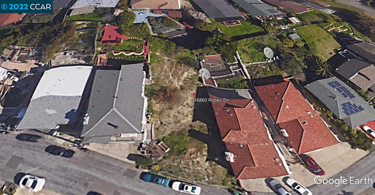 an aerial view of a highlighted house