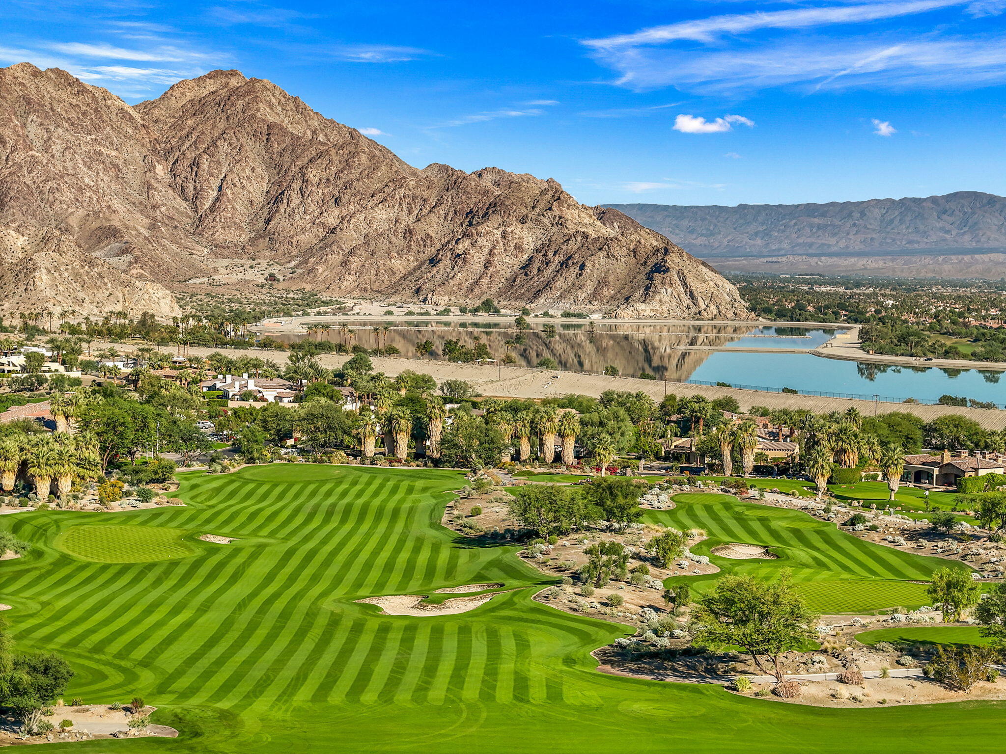 58845 Quarry Ranch Road La Quinta, CA 92253 - Photo 6 of 29 a view of a large building with a yard