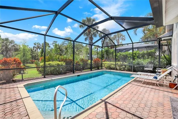 a view of swimming pool with a patio