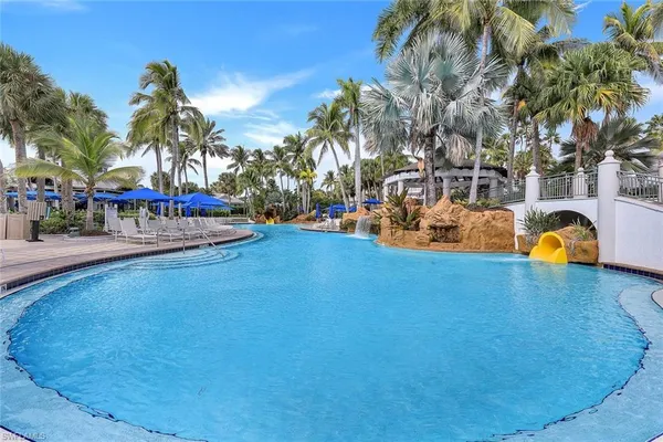 an aerial view of a house with a lake view