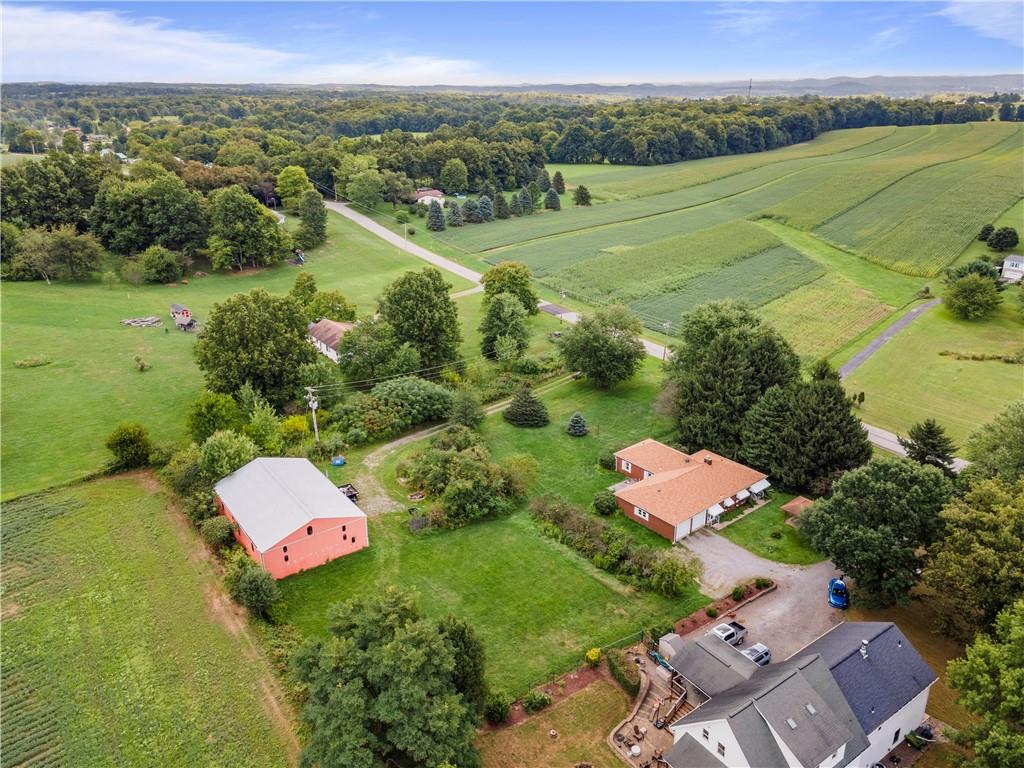 157 Lardintown Road Sarver, PA 16055 - Photo 3 of 24 an aerial view of a house with a garden