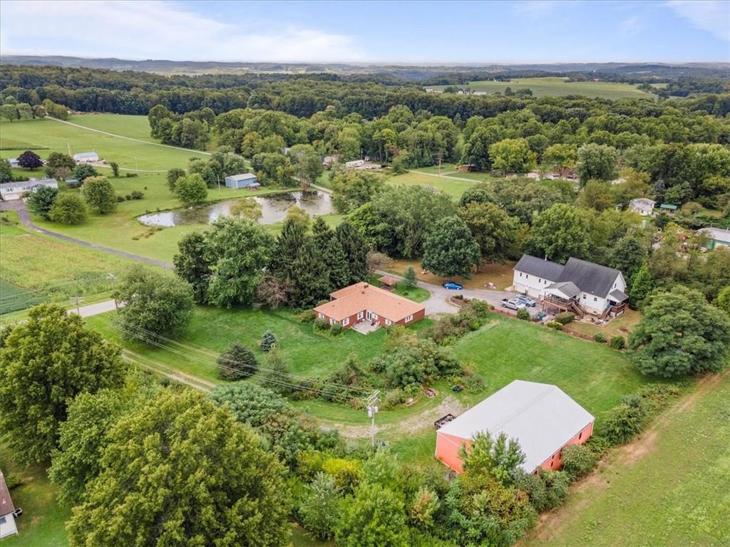 157 Lardintown Road Sarver, PA 16055 - Photo 4 of 24 a view of a lush green hillside and houses