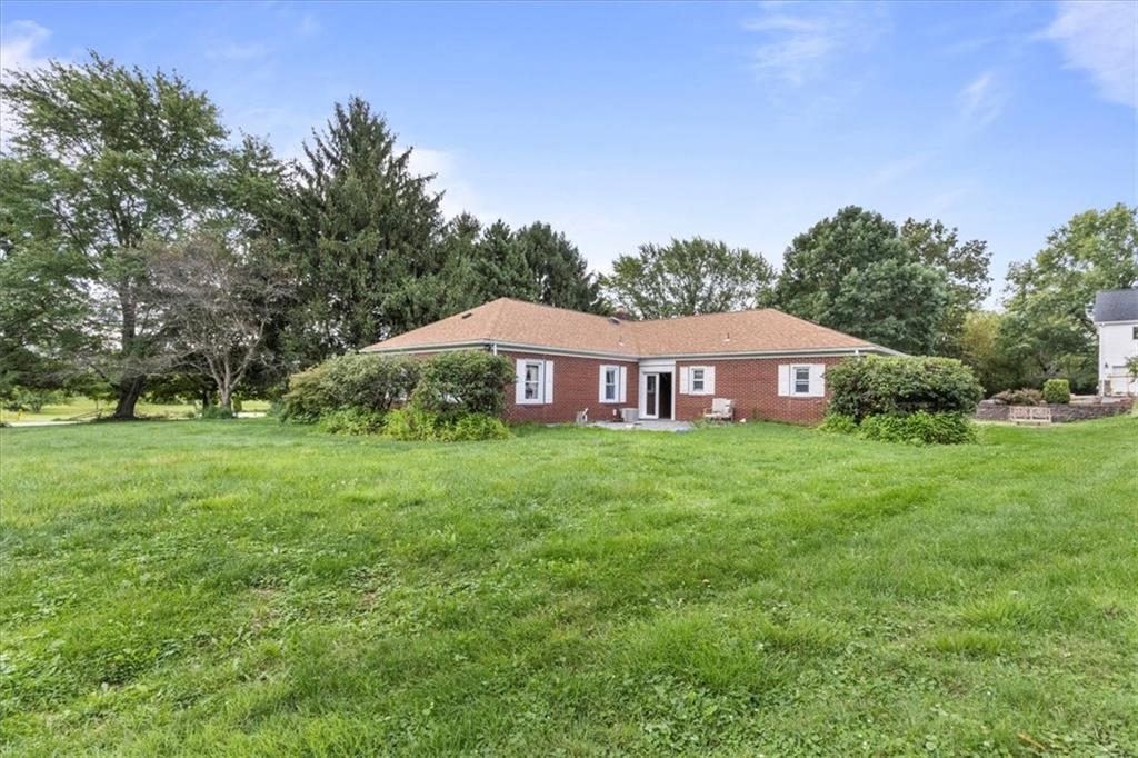 157 Lardintown Road Sarver, PA 16055 - Photo 6 of 24 a front view of a house with garden