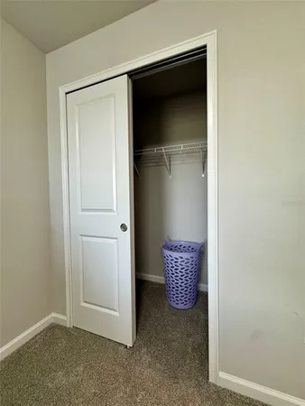 a view of entryway with cabinet