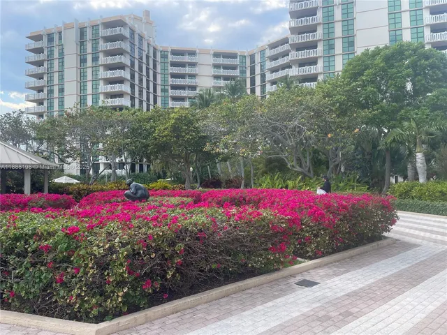 a view of a tall building in the middle of a city