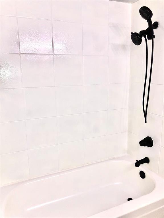 9601 Walnut Street, Unit 5101 Dallas, TX 75243 - Photo 9 of 11 a bathroom with a shower