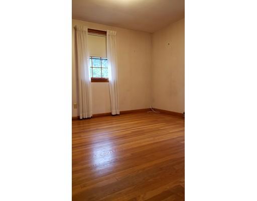 9 Claude Road Chelmsford, MA 01824 - Photo 13 of 21 a view of an empty room with wooden floor