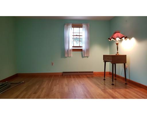 9 Claude Road Chelmsford, MA 01824 - Photo 16 of 21 a open kitchen with a table and a potted plant