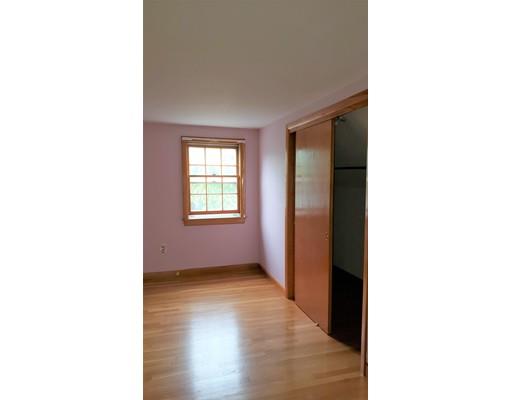 9 Claude Road Chelmsford, MA 01824 - Photo 20 of 21 a view of an empty room with wooden floor and a window