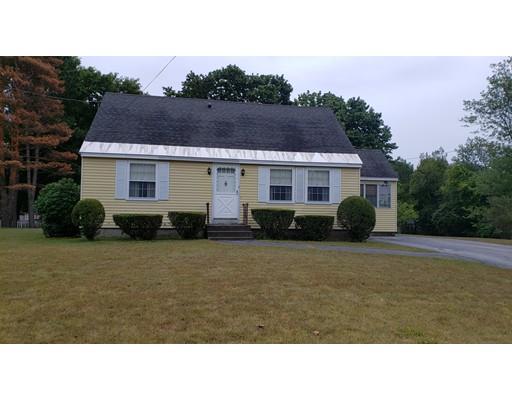 9 Claude Road Chelmsford, MA 01824 - Photo 4 of 21 a black and white photo of a house