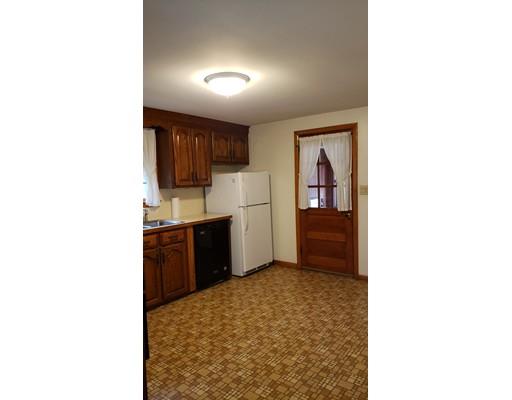 9 Claude Road Chelmsford, MA 01824 - Photo 6 of 21 a kitchen with granite countertop cabinets and refrigerator