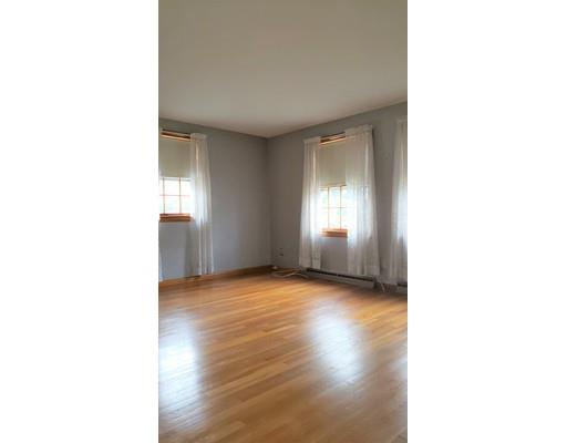 9 Claude Road Chelmsford, MA 01824 - Photo 10 of 21 a view of an empty room with wooden floor and a window