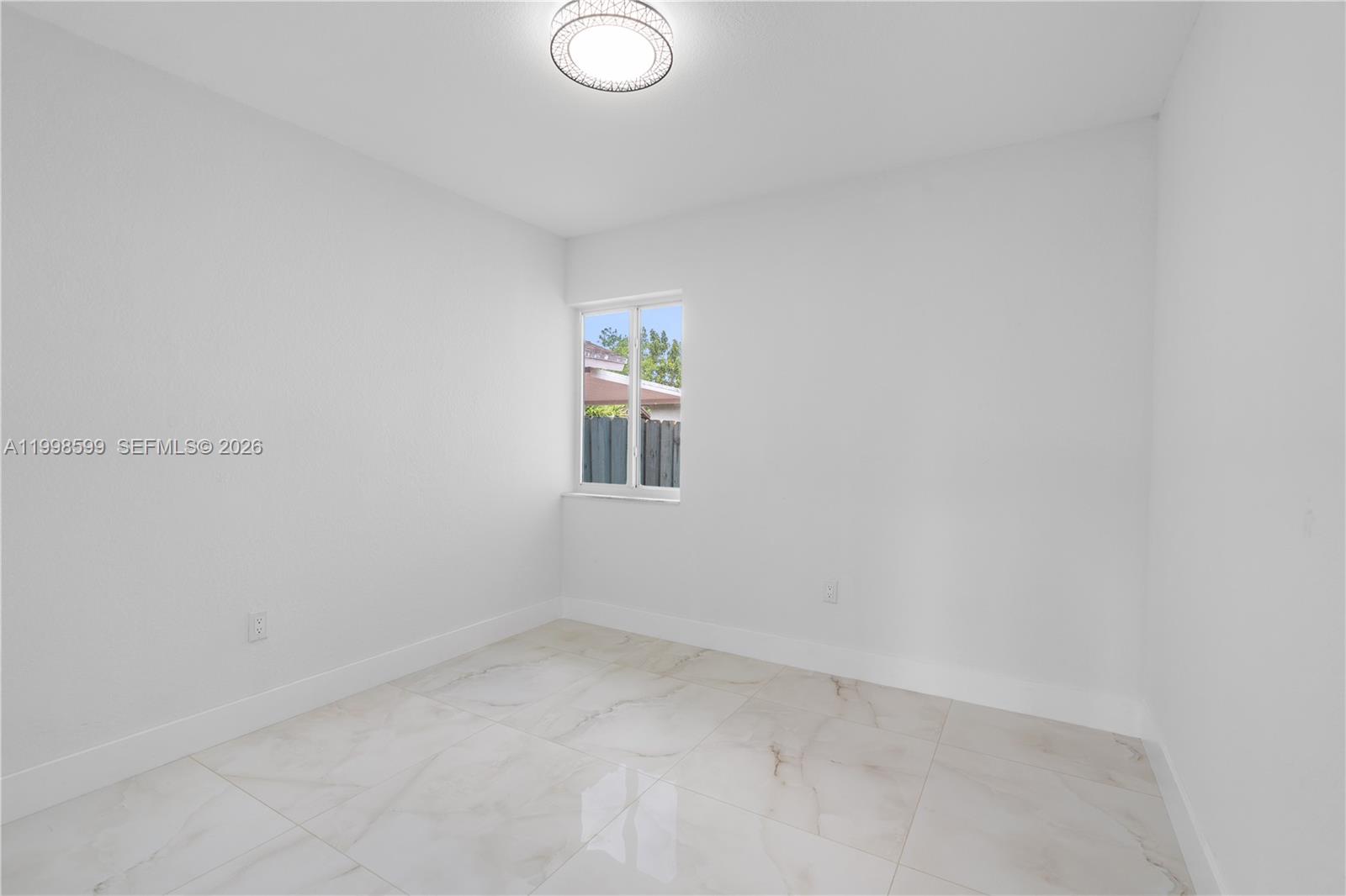 16345 Southwest 303rd Street Homestead, FL 33033 - Photo 15 of 19 a view of an empty room