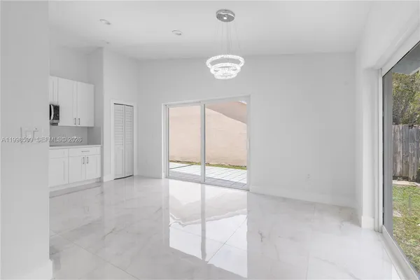 a view of cabinets and window