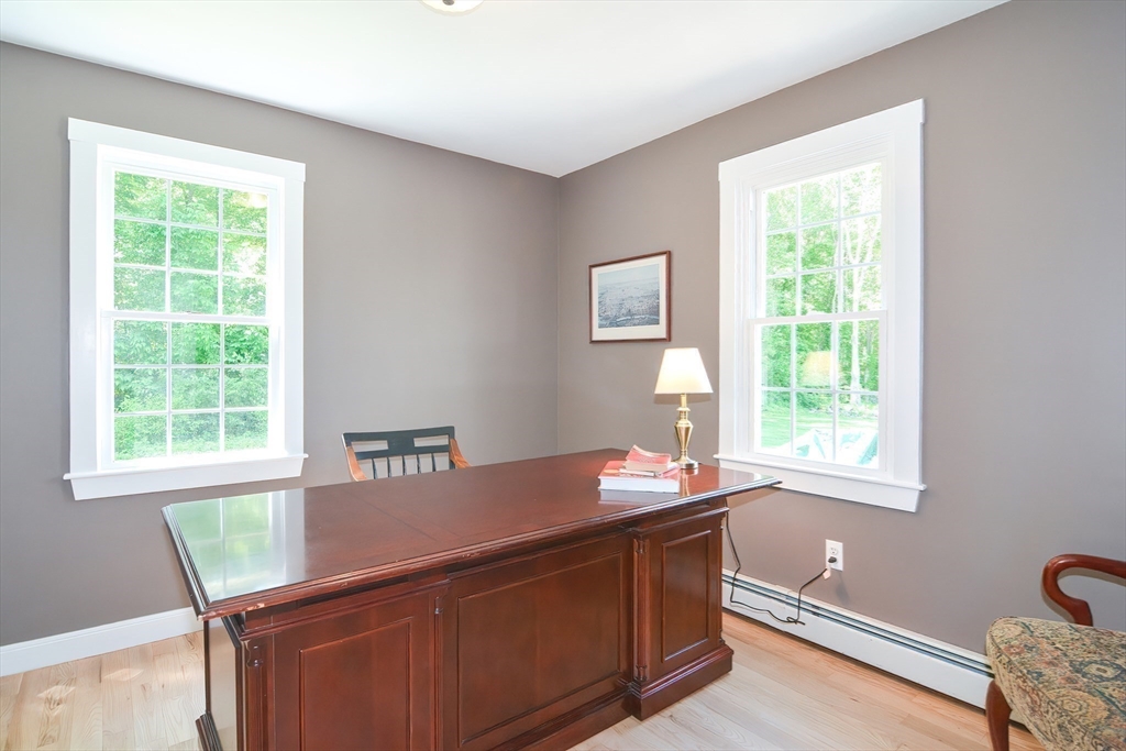 13 Park Street Mendon, MA 01756 - Photo 17 of 37 a room with a window and a lounge chair