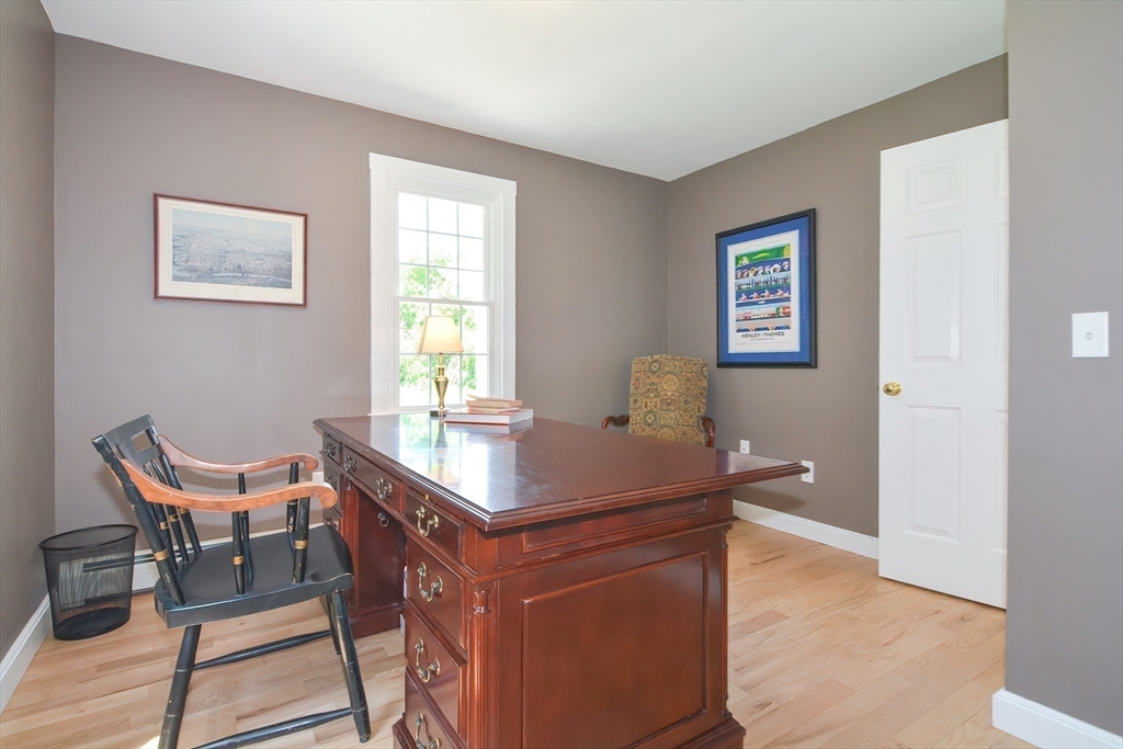 13 Park Street Mendon, MA 01756 - Photo 18 of 37 a room with a table and chairs