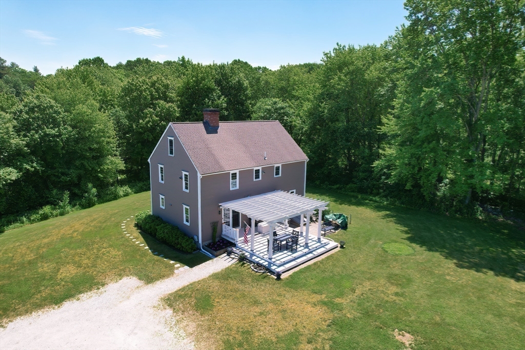 13 Park Street Mendon, MA 01756 - Photo 30 of 37 a aerial view of a house with a big yard