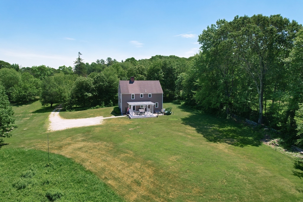 13 Park Street Mendon, MA 01756 - Photo 33 of 37 a view of a big house with a big yard plants and large trees