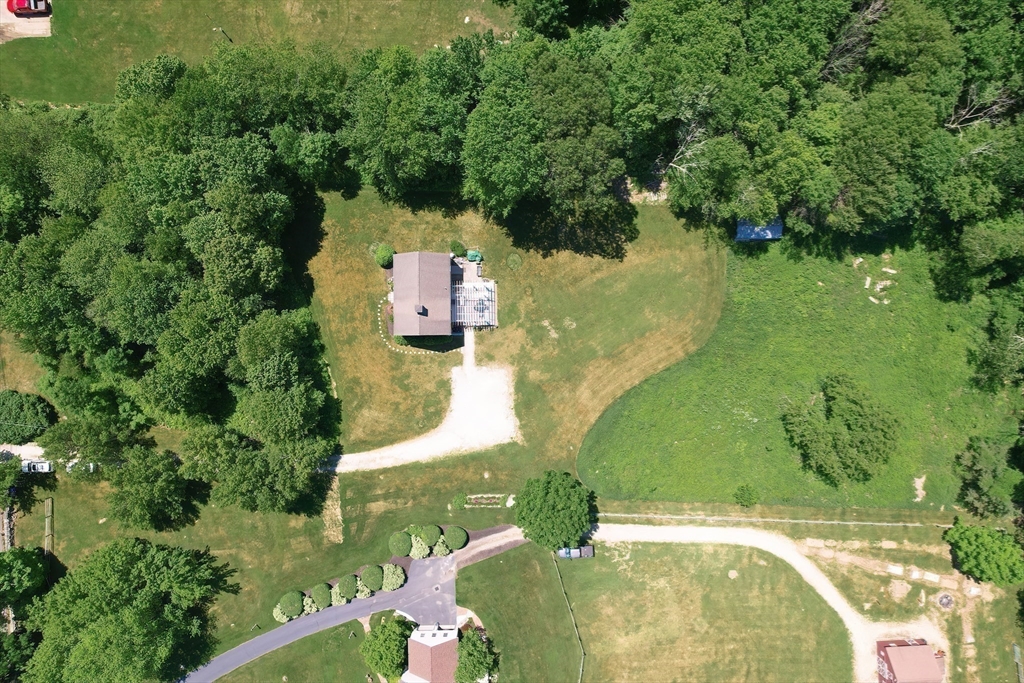 13 Park Street Mendon, MA 01756 - Photo 36 of 37 an aerial view of residential houses with outdoor space and trees all around