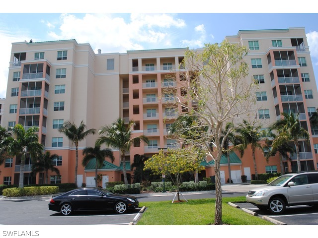 2060 Matecumbe Key Road Punta Gorda, FL 33955 - Photo 1 of 16 a view of a cars parked in front of a building