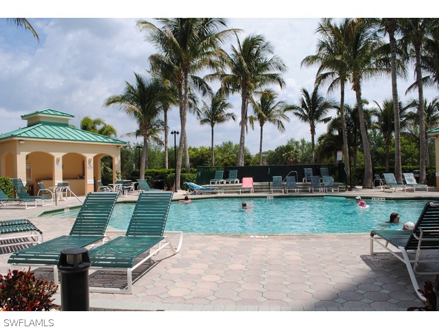 2060 Matecumbe Key Road Punta Gorda, FL 33955 - Photo 11 of 16 a view of a backyard and swimming pool