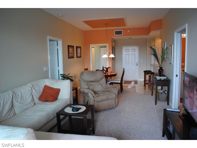 2060 Matecumbe Key Road Punta Gorda, FL 33955 - Photo 3 of 16 a living room with furniture and a couch