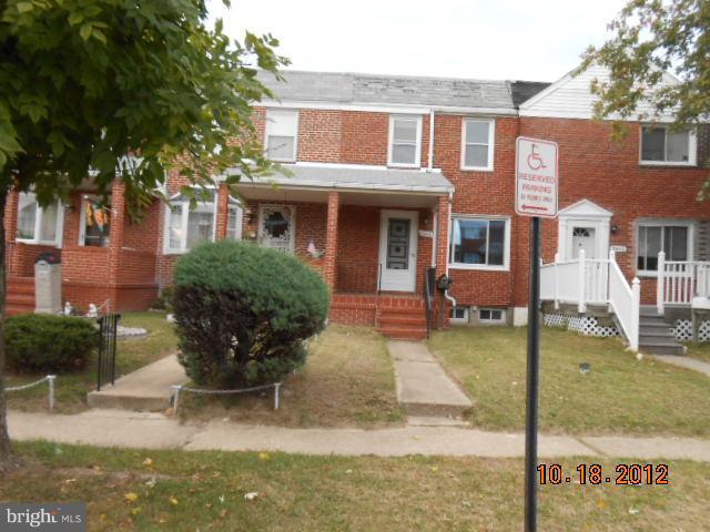 7444 Durwood Road Baltimore, MD 21222 - Photo 1 of 11 a view of a yard in front of house