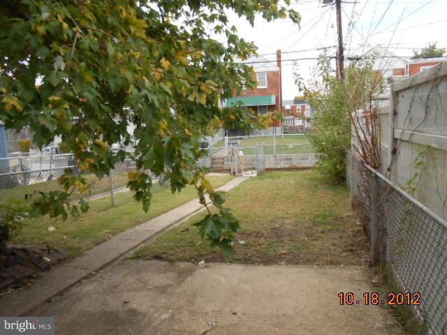 7444 Durwood Road Baltimore, MD 21222 - Photo 2 of 11 a view of a yard with plants