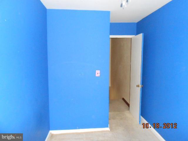 7444 Durwood Road Baltimore, MD 21222 - Photo 7 of 11 a view of a hallway