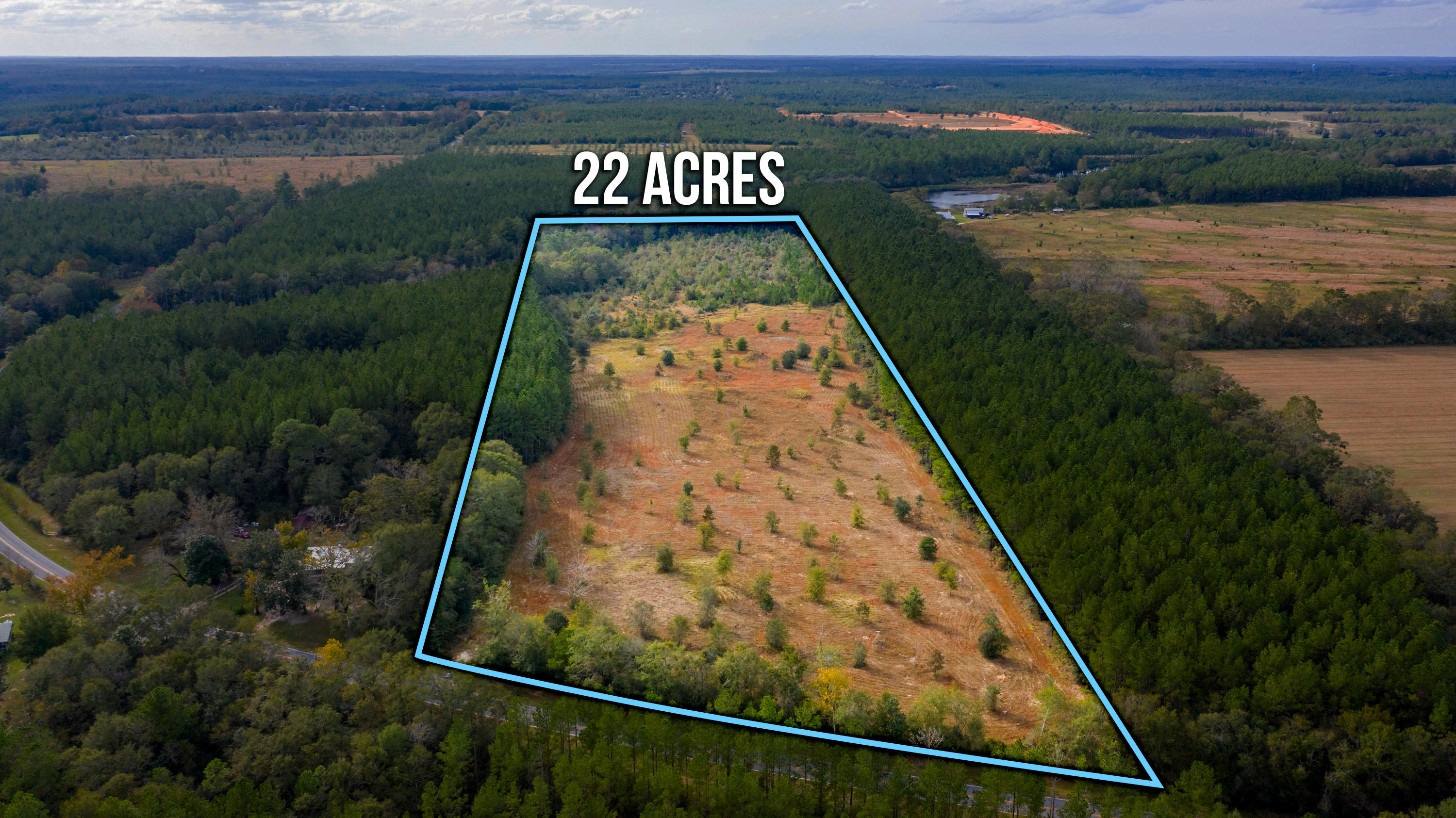 22-acres Williams Road DeFuniak Springs, FL 32433 - Photo 1 of 5 an aerial view of swimming pool