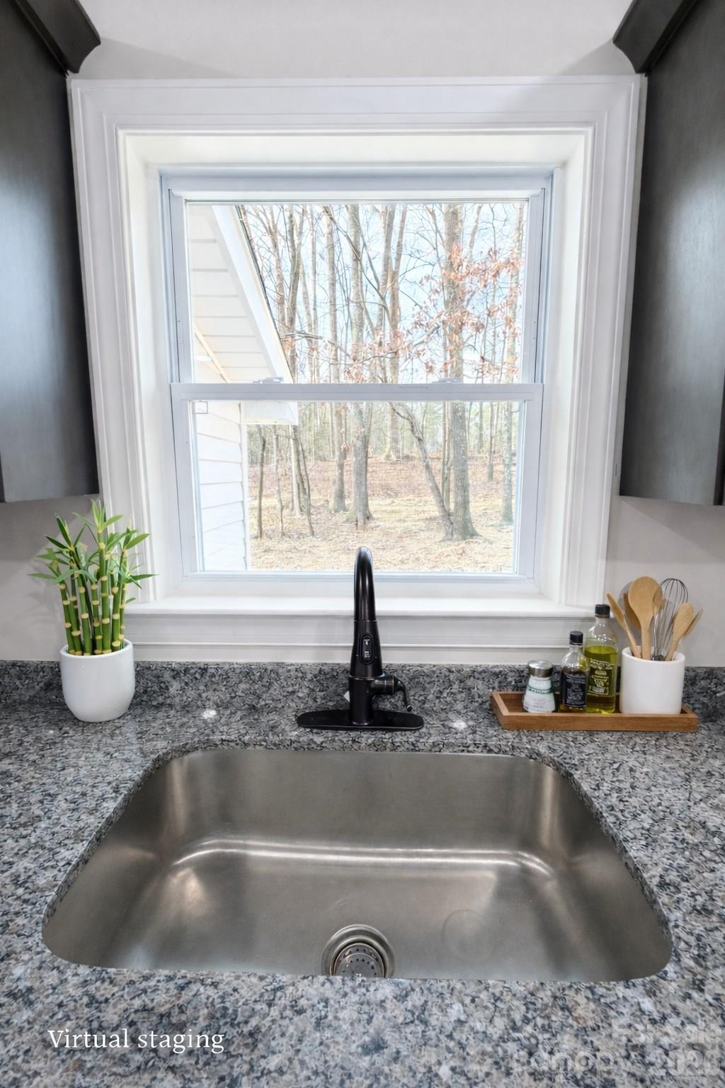 2201 Airdale Road Lancaster, SC 29720 - Photo 13 of 25 a bathroom with a granite countertop sink and a bathtub