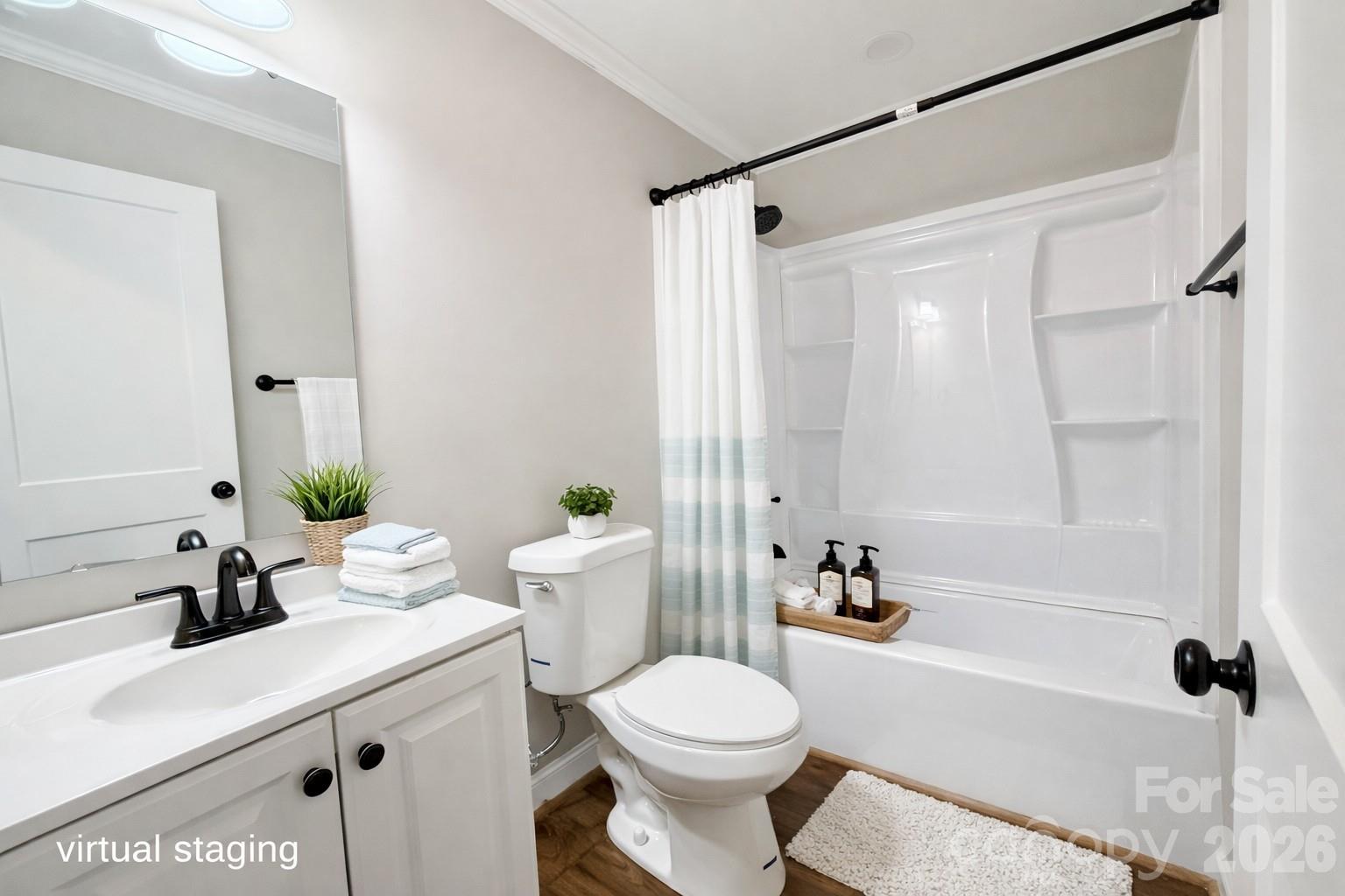 2201 Airdale Road Lancaster, SC 29720 - Photo 16 of 25 a bathroom with a sink a toilet a tub and a shower