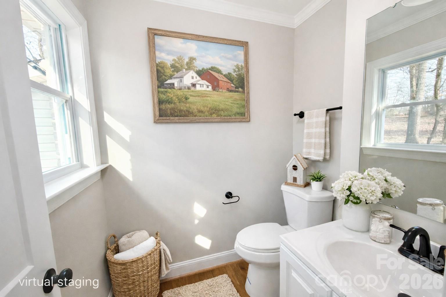 2201 Airdale Road Lancaster, SC 29720 - Photo 21 of 25 a bathroom with a sink toilet and window