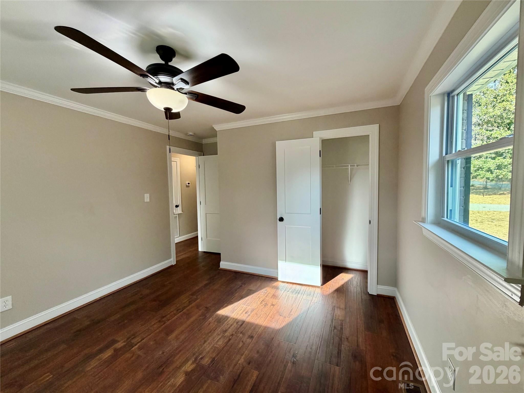 2201 Airdale Road Lancaster, SC 29720 - Photo 23 of 25 a view of an empty room with wooden floor and a window