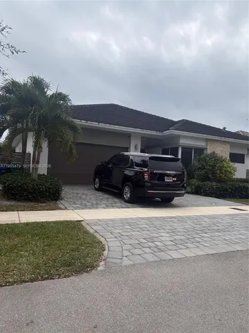 a car parked in front of house